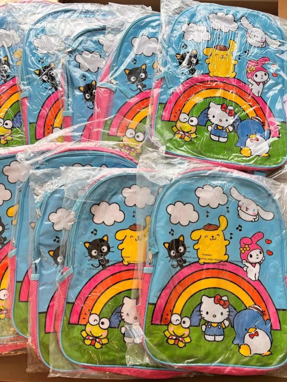 Wholesale Lot of 12 Hello Kitty And Friends Rainbow Children's Pink Backpack NWT